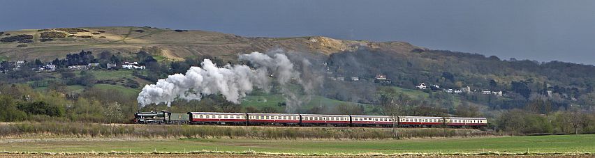 Cleeve Hill provides a stunning backdrop to a GWR locomotive. Picture by Andrew Hill.